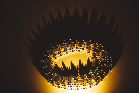 Golden christmas garland, abstract background and texture beads close up. Holiday conceptの写真素材