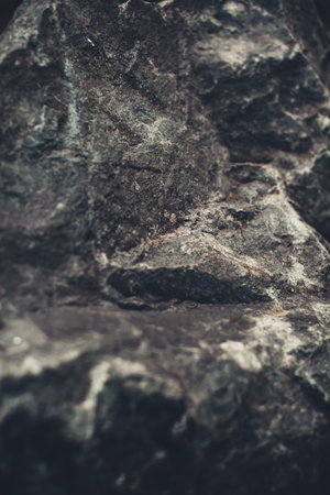 Stone dark background, texture and structure of the mountain landscape close-upの写真素材