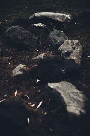 Stone dark background, texture and structure of the mountain landscape close-up