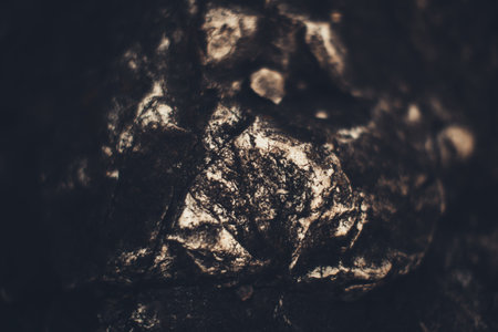 Natural Stone texture background in dark colors, close - up of the mountain landscape structureの写真素材