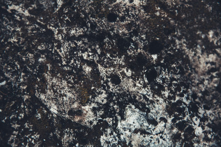 close-up rock texture, stone pattern and abstraction on the rocks of the mountains