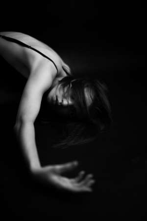 fashion monochrome portrait of sexy beautiful young woman in bodysuit. Sexy girlの写真素材