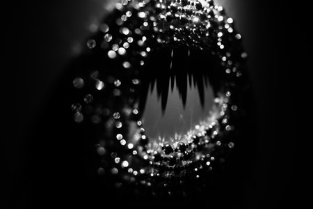 garland of silver beads close-up, beautiful abstract composition, New Year and holiday backgroundの写真素材