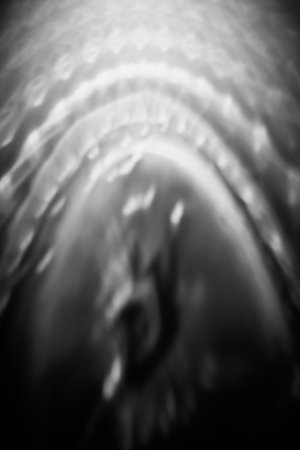 black and white abstract background, beautiful glow from the fire, textured backgroundの写真素材