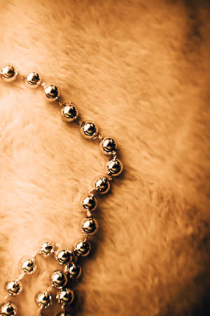 beautiful beads on a fur capeの写真素材