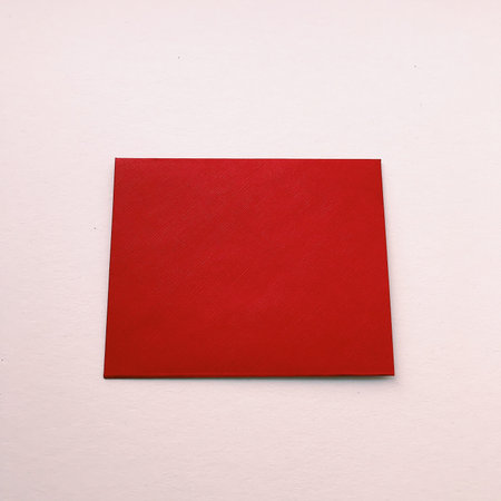 Red envelope on a neutral background. Postal composition, top view, space for text. The concept of...