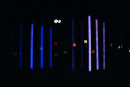 Abstract blue and purple background, colorful night lights and light representationの写真素材