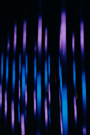 Abstract blue and purple background, colorful night lights and light representationの写真素材