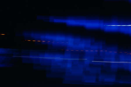 Abstract blue and purple background, colorful night lights and light representationの写真素材