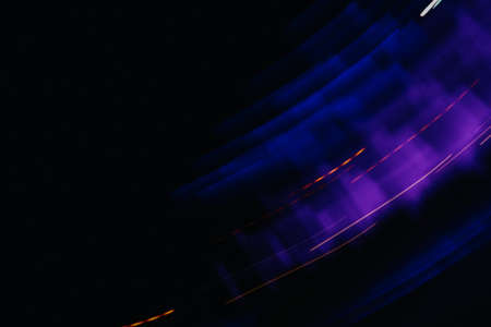 Abstract blue and purple background, colorful night lights and light representationの写真素材