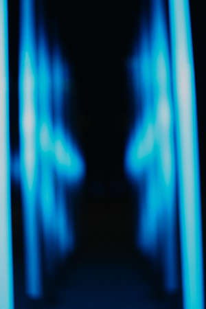 Abstract blue and purple background, colorful night lights and light representationの写真素材