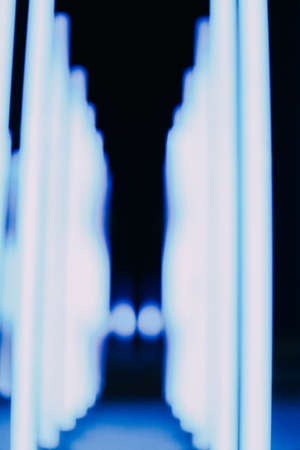 Abstract blue and purple background, colorful night lights and light representationの写真素材