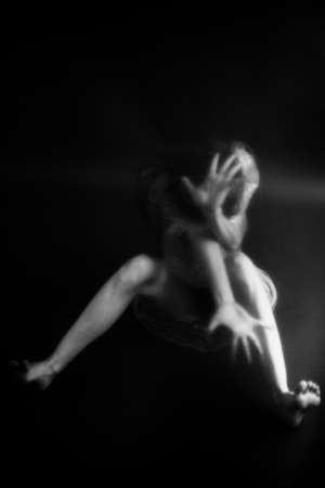 beautiful female legs, black and white portrait of human body parts, fuzzy and noisy film photography, art and fashionの写真素材