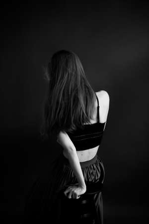 Black and white art fashion surrealistic portrait of beautiful woman, fashion studio portrait of beautiful model, details of bodyの写真素材