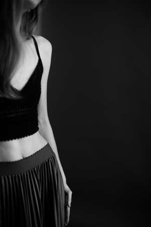 Black and white art fashion surrealistic portrait of beautiful woman, fashion studio portrait of beautiful model, details of bodyの写真素材