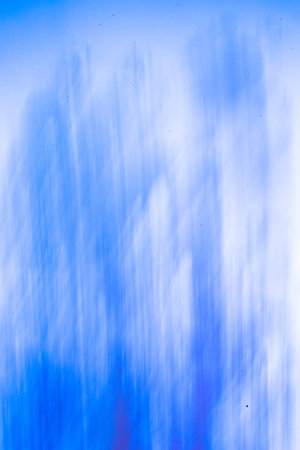 Abstract blue background, hand painted texture, painted with acrylics, splashes, drops of paint, paint strokes. Design for backgrounds, wallpapers, covers and packaging.の写真素材