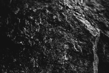 abstract rocky background, mountains and texture elements of stones close-up, black and white textureの写真素材
