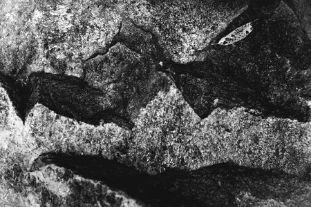 abstract rocky background, mountains and texture elements of stones close-up, black and white...
