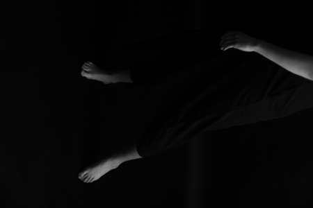 women's legs close-up, black and white photo of body details, elegant and sensual fingersの写真素材