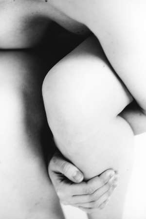 details of body black and white portrait of beautiful girl, fuzzy and blurry art photographyの写真素材