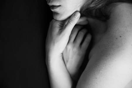 details of body black and white portrait of beautiful girl, fuzzy and blurry art photographyの写真素材