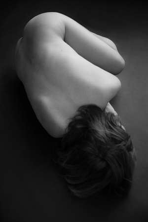 details of body black and white portrait of beautiful girl, fuzzy and blurry art photographyの写真素材