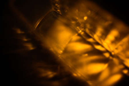 abstract orange blurred background, glare and light, bokeh and soft focusの写真素材