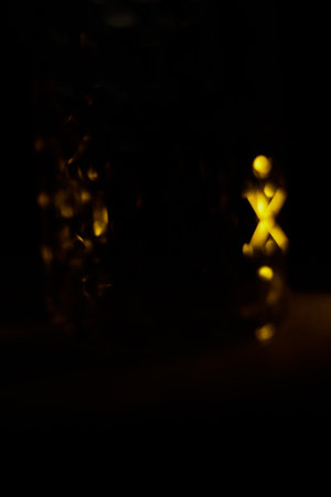 abstract orange blurred background, glare and light, bokeh and soft focusの写真素材