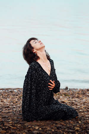 black and white fuzzy film portrait of a young girl, blurry and blurry photo of a womanの写真素材