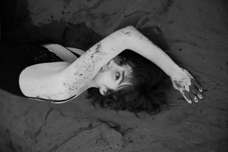 black and white fuzzy film portrait of a young girl, blurry and blurry photo of a womanの写真素材