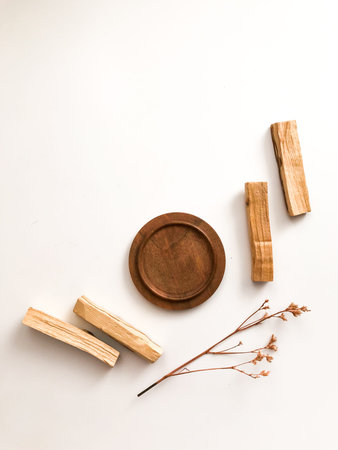 A set of wooden sticks Palo Santo on a white background. Aromatherapy and religious rites and...