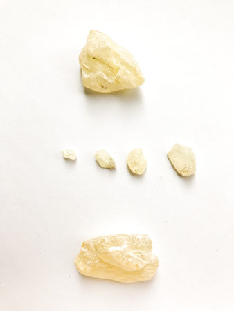 natural incense, dammar resin close-up on a white background. Soft focus, place for text and and top...