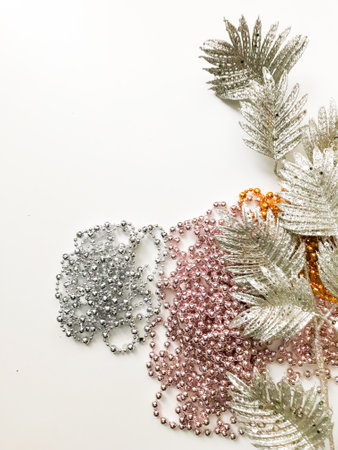 Christmas background of beautiful glass and colorful garlands. Flat lay, top view.の写真素材