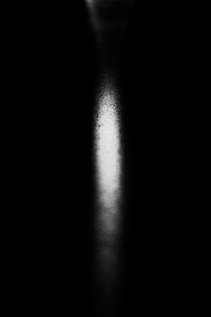 abstract black and white frizlight, glare and spots of light smeared and blurred, noisy images