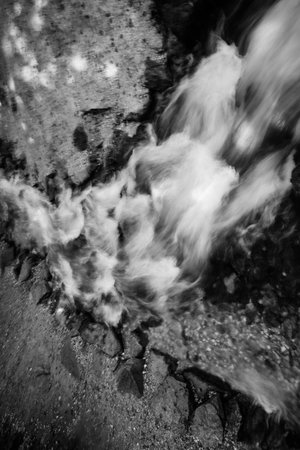 black and white texture of water, blurring and blurring of the image, soft focus and defocusing of...