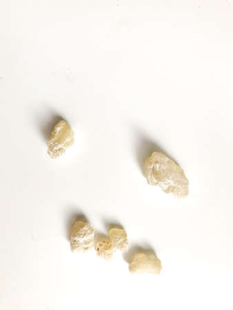 transparent resin wood, dammar close-up on a white backgroundの写真素材