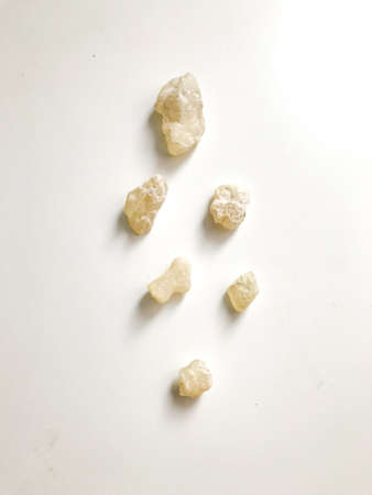 transparent resin wood, dammar close-up on a white backgroundの写真素材