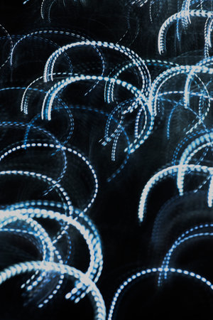 blue and blue frizlight background, abstract image of LED strip on long exposure
