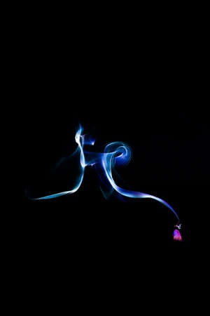 Blue smoky fan, clouds of smoke from cigarettes and vapingの写真素材