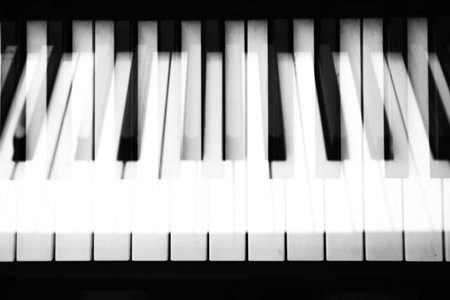 Background music, black and white piano keys in the dark