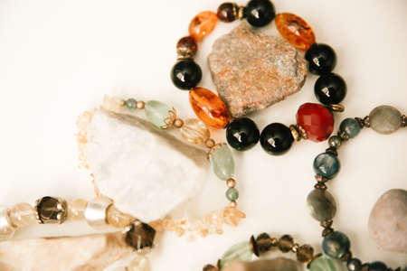 Jewelry and bracelets made of natural stones, natural minerals, top view and place for textの写真素材