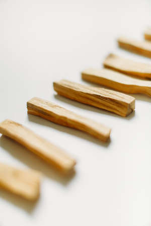 bunch of wooden palo santo sticks on a neutral background. soft focus, macro frameの写真素材