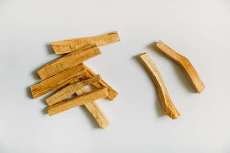 wooden palo santo sticks on a white background, incense setの写真素材