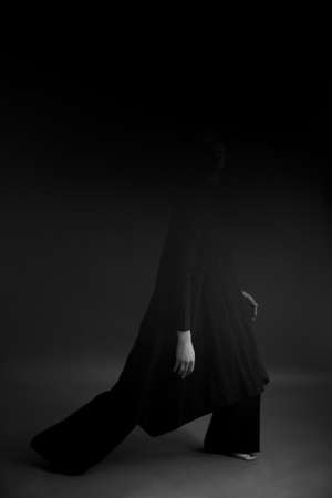 dramatic portrait of dancer, body details and beautiful pose of movement, defocus and frame on film cameraの写真素材