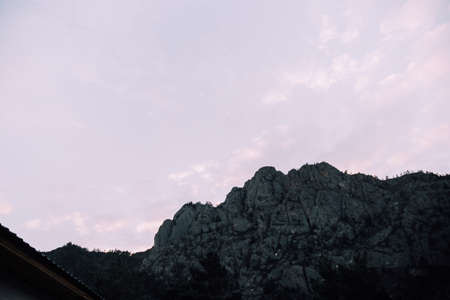 Silhouette of a mountain against the background of the sky.の写真素材