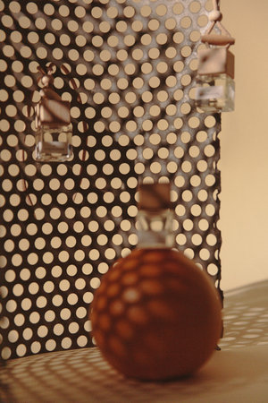 Vintage christmas decoration, closeup of wooden ball and garlandの写真素材