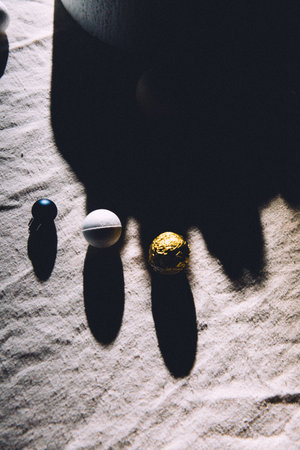 Easter eggs with a shadow of a hand.