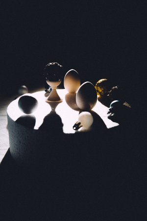 Easter eggs on a dark background. Minimalism style.の写真素材