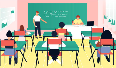 In the classroom, one of the students answers at the blackboard. Teacher oversees students. Learning...