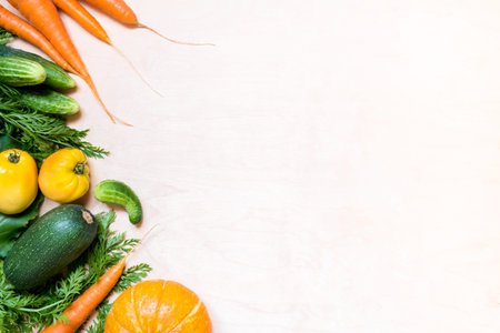 Top view fresh organic vegetables on wooden background. flat lay. Copy space.